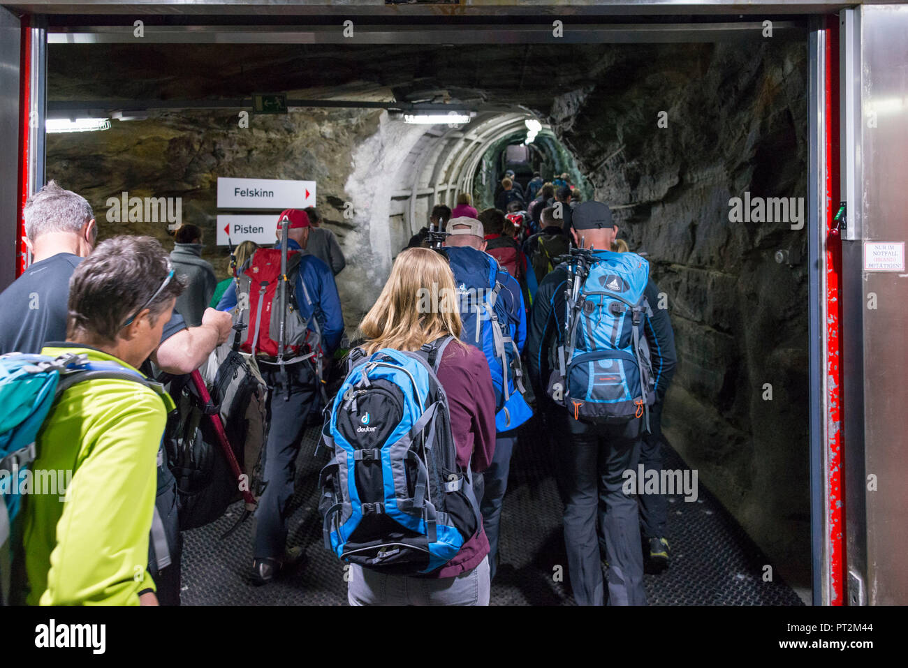 Switzerland, canton Valais, Verbier, high plateau, Saas Valley, Saas-Fee, Fee Glacier, metro Alpin, highest underground in the world with terminus at 3456 m, people getting off the Metro Alpin Stock Photo