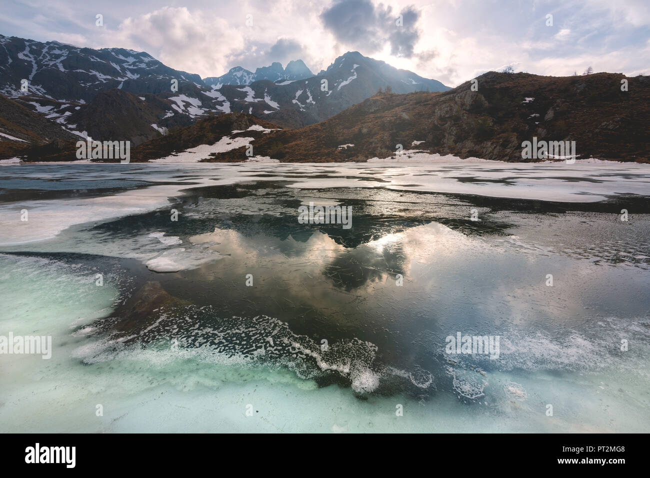 Seroti lake at thaw in Stelvio national park, Lombardy district, Brescia province Italy, Stock Photo