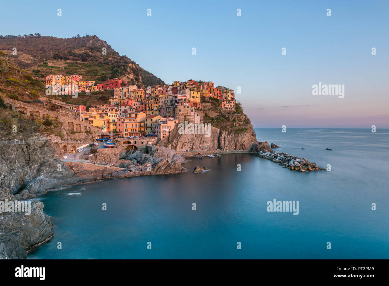 Italy, Liguria, La Spezia, Cinque Terre National Park, Manarola in the evening light Stock Photo