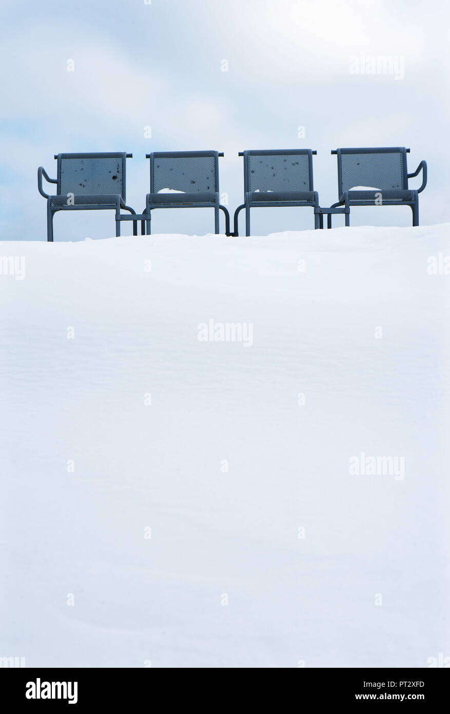 Austria, Upper Austria, Mühlviertel, chairs in snow near Bad Kreuzen Stock Photo