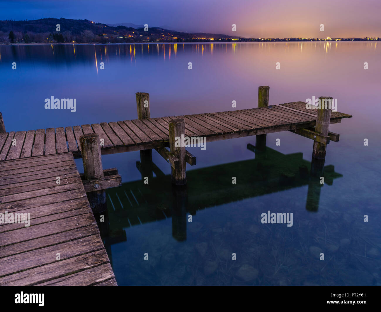 The lights of Wetzikon reflecting from the sky over the Pfäffikersee Stock Photo