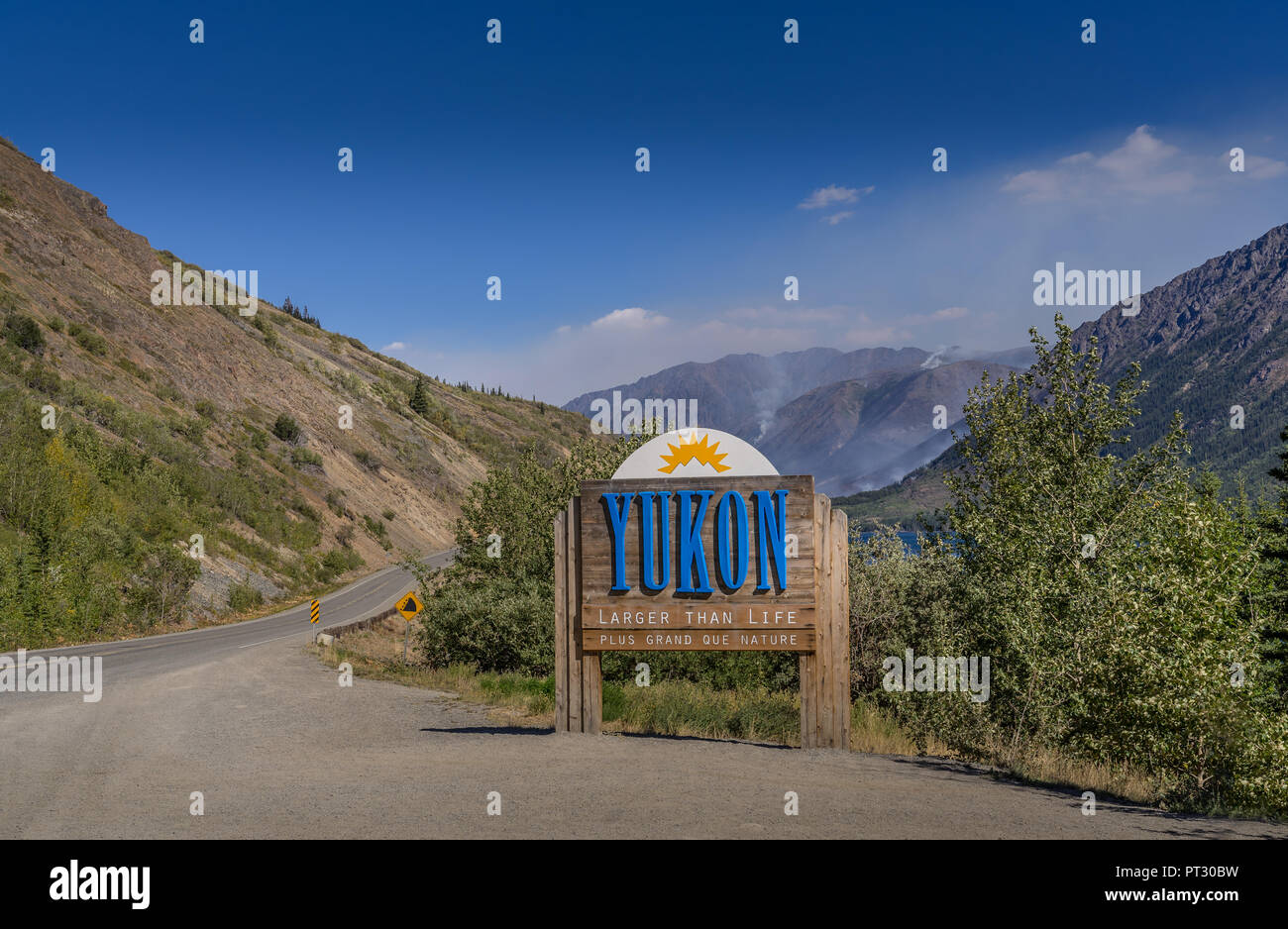 Yukon Territories road sign along highway entering the Yukon Territories from Alaska. Stock Photo