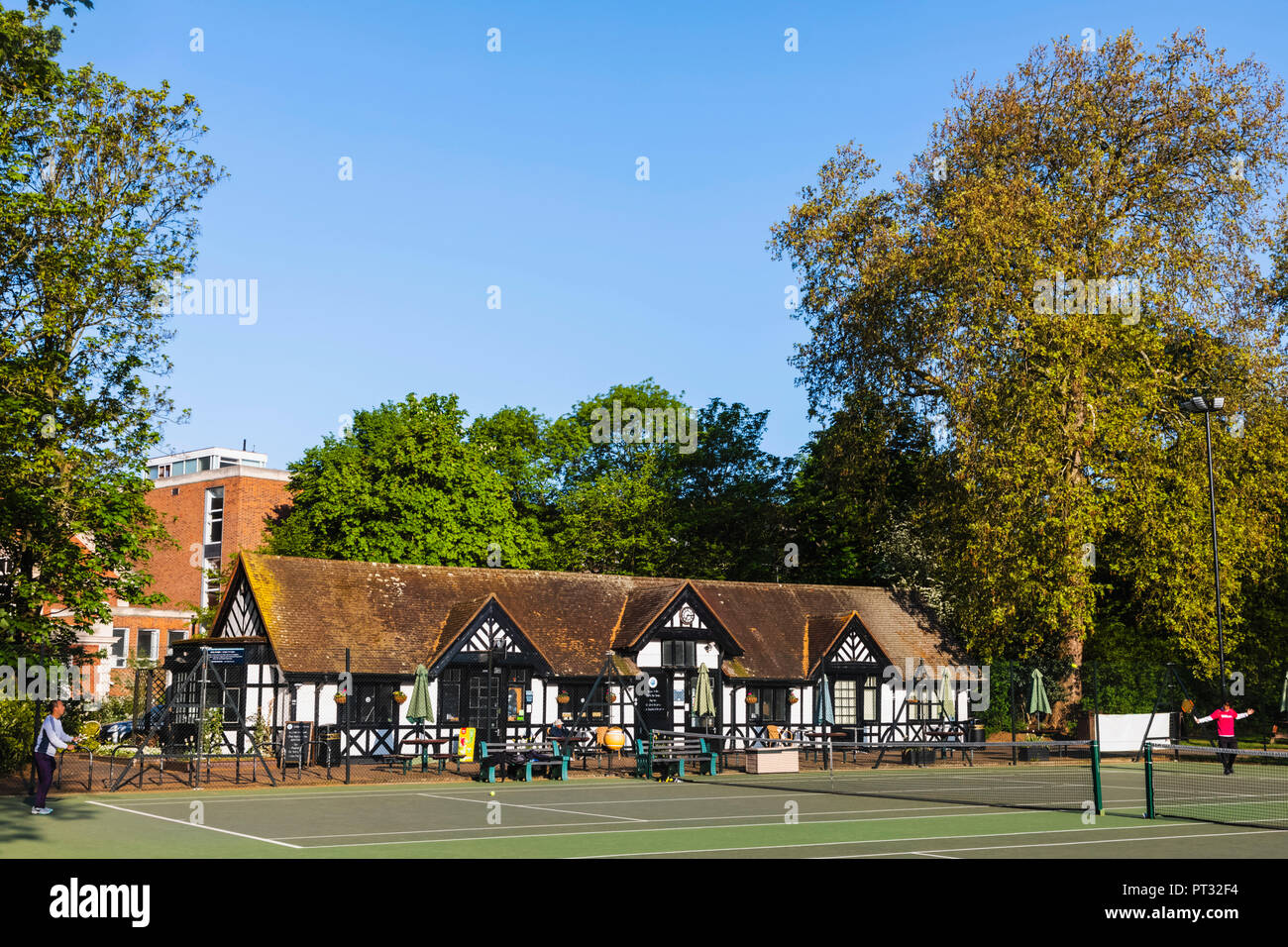 England, London, Regent's Park, Regent's Park Tennis Centre, Men Playing Tennis Stock Photo