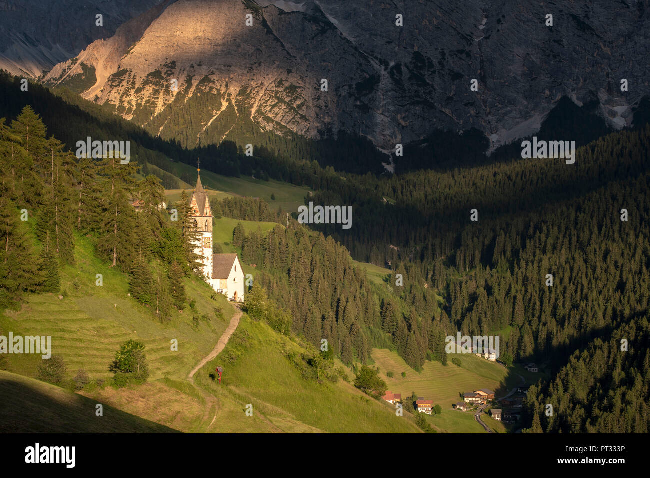 La Valle / Wengen, Alta Badia, Bolzano province, South Tyrol, Italy, The St, Barbara chapel at sunset Stock Photo