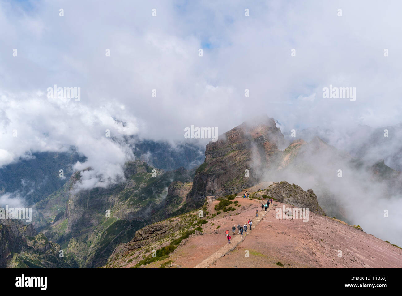 People walking on the trail at Pico do Areeiro, Funchal, Madeira region, Portugal, Stock Photo