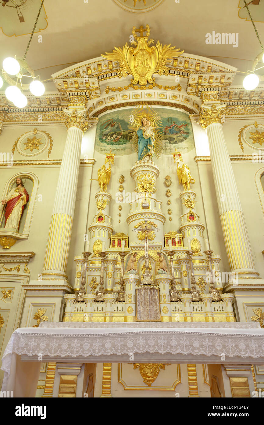 QUEBEC CITY, CANADA - AUG 21, 2012: Altar of the famous Notre-Dame-des-Victoires (Our Lady of Victories) Church at Place Royale in Old Quebec city. Er Stock Photo