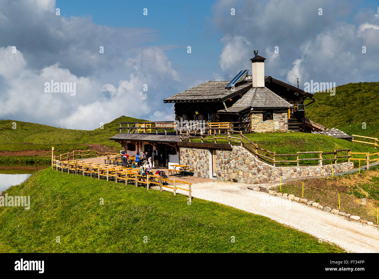 Europe, Italy, Alps, Dolomites, Mountains, Passo Rolle - Rifugio Baita Segantini Stock Photo