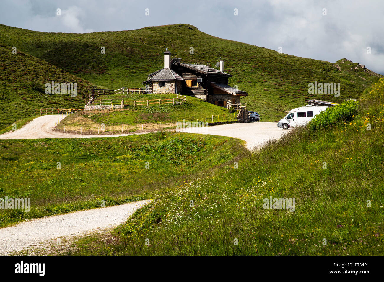 Europe, Italy, Alps, Dolomites, Mountains, Passo Rolle - Rifugio Baita Segantini Stock Photo