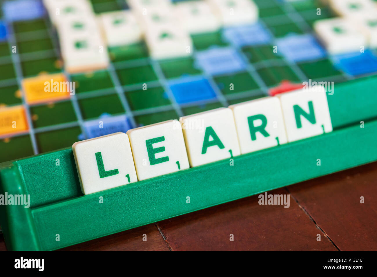 Bangkok, Thailand - September 19, 2018 : Learn word made from Scrabble's letter tiles. Stock Photo