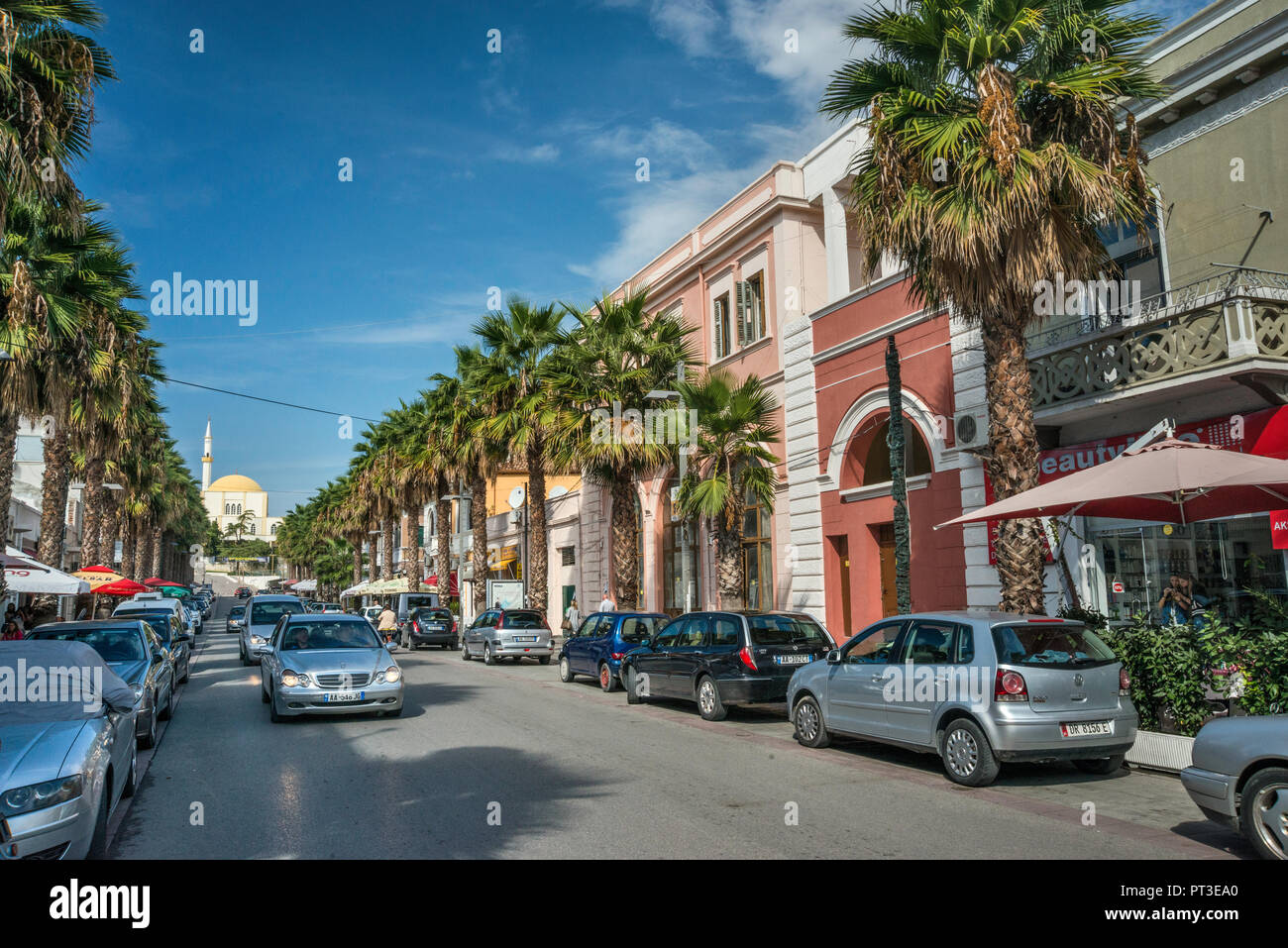 New mosque in distance at Bulevardi Epidamn aka rruga Tregtare, street in Durres, Albania Stock Photo