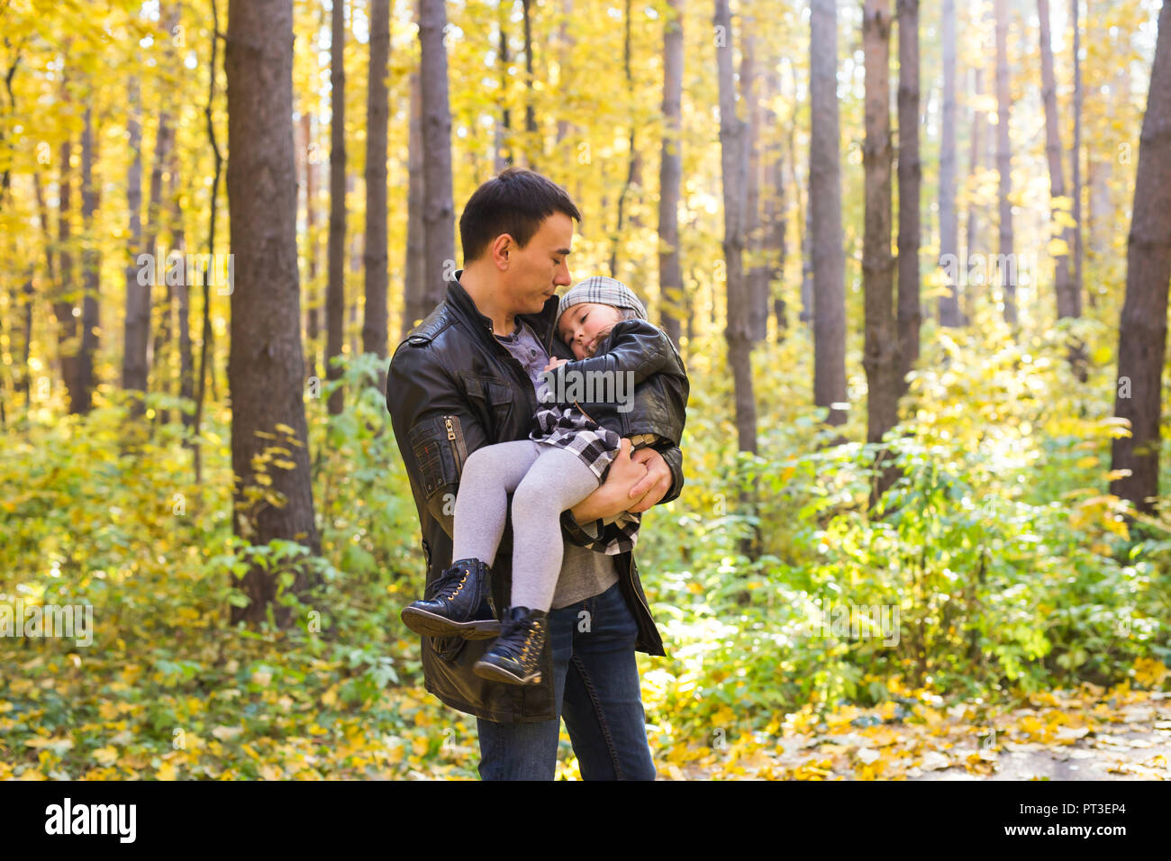Happy family father and child daughter on a walk in autumn park Stock ...