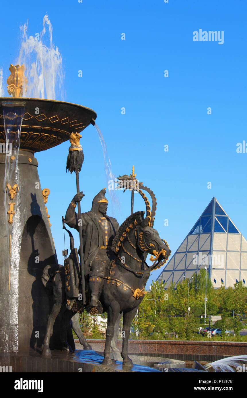 Kazakhstan; Astana; fountain, kazakh warriors statue, Palace of Peace and Reconciliation, Stock Photo