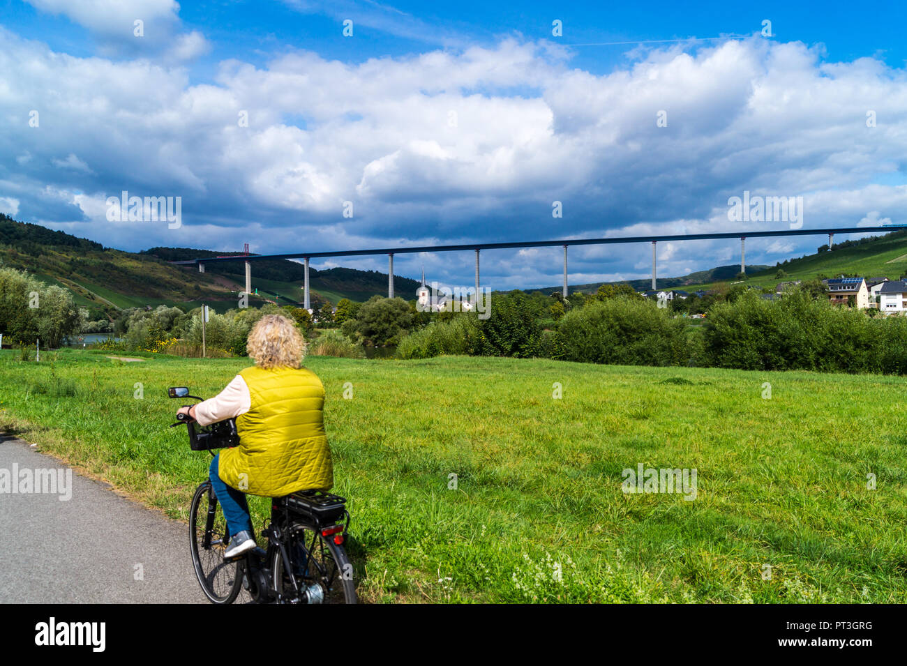 Female looking over bridge hi-res stock photography and images - Alamy