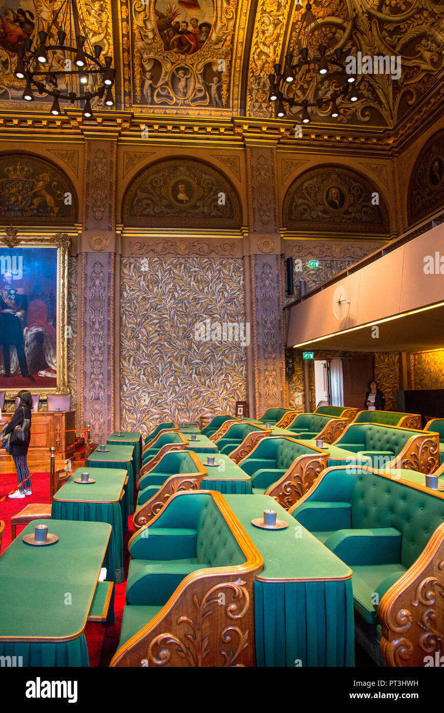 green chairs in first chamber of dutch parliament building in Den Haag