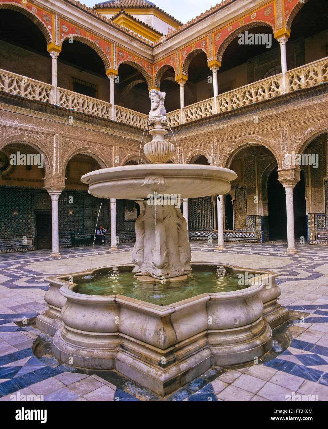 Casa de Pilatos Palace (16th century), Courtyard whith fountain of Roman god Janus Bifrons, Seville, Region of Andalusia, Spain, Europe Stock Photo