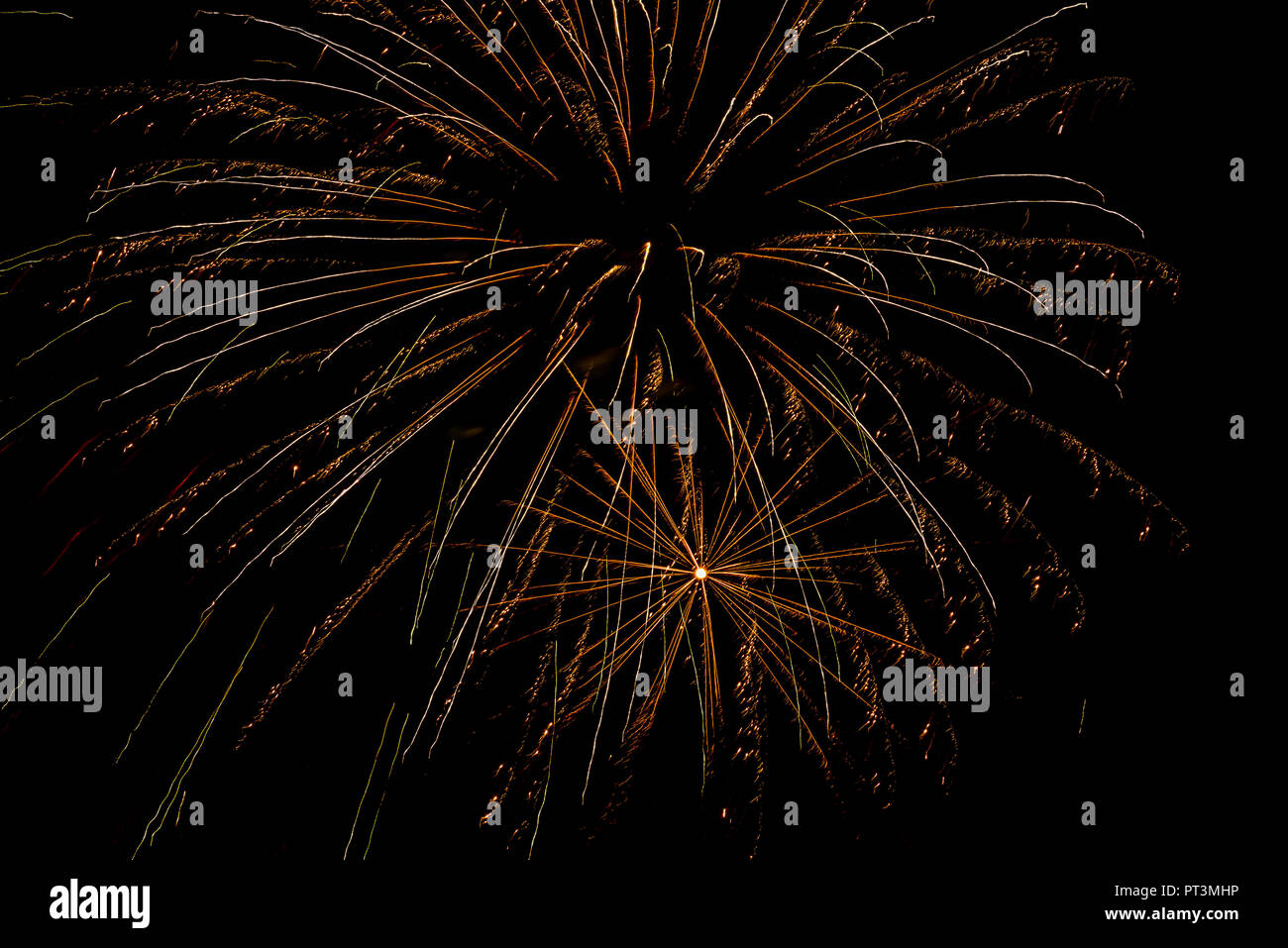 Radiant fireworks display in dark hi-res stock photography and images ...