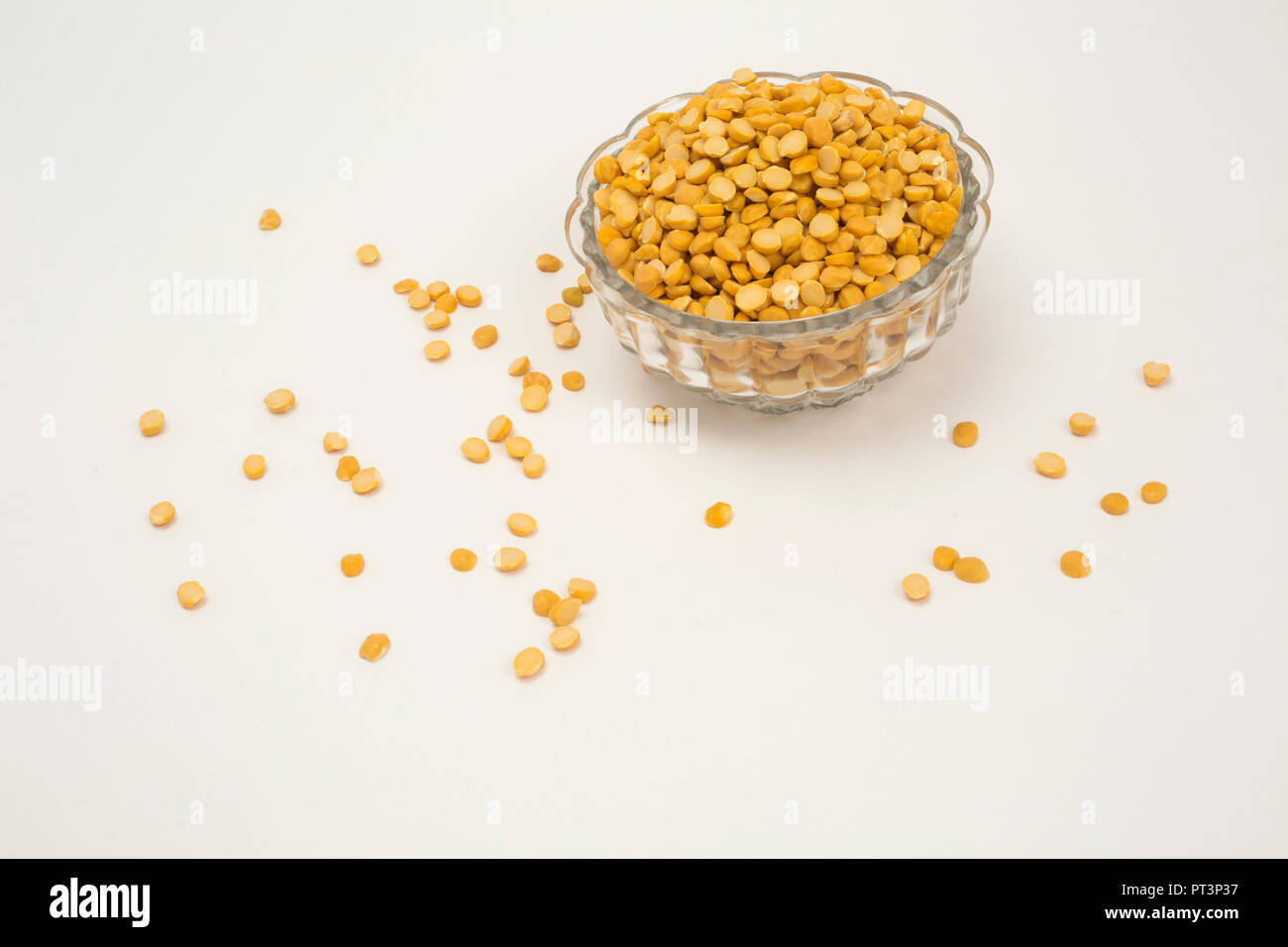 Yellow split chickpea peas boot chana dal in bowl pulse isolated on