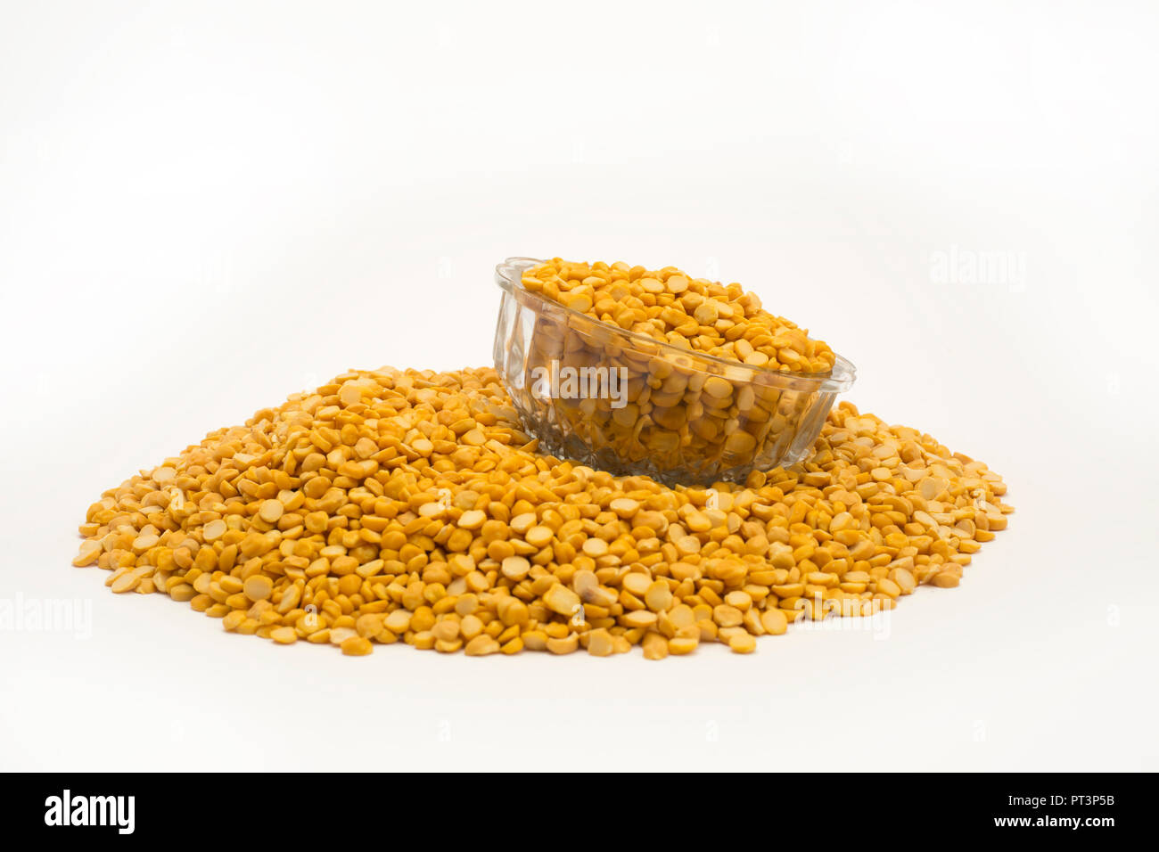 Yellow split peas boot chana dal with bowl. isolated on white
