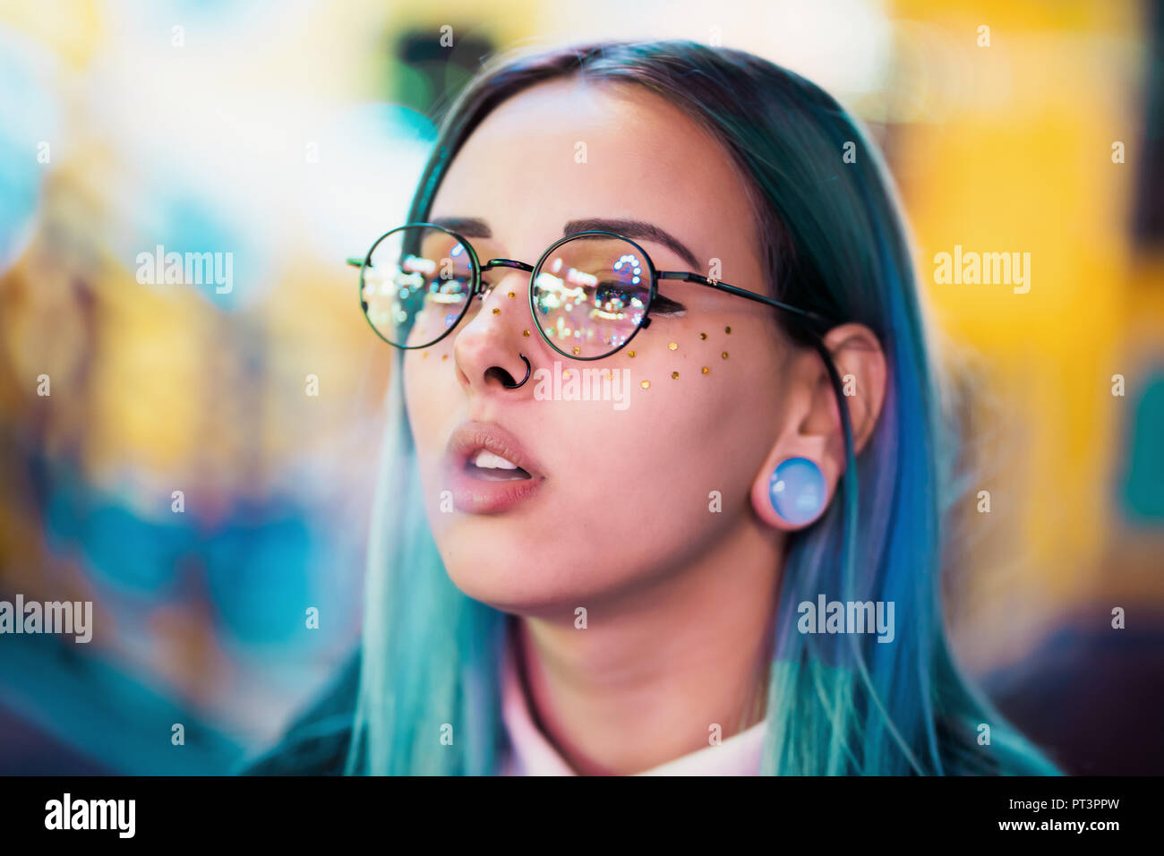 Millennial Pretty Girl With Unusual Dyed Hairstyle Smoking