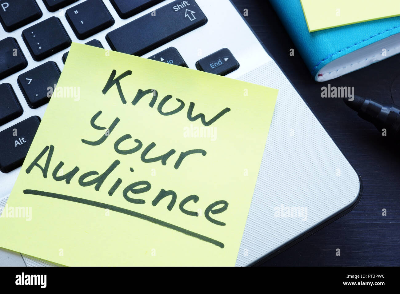 Know your audience written on the memo. Stock Photo