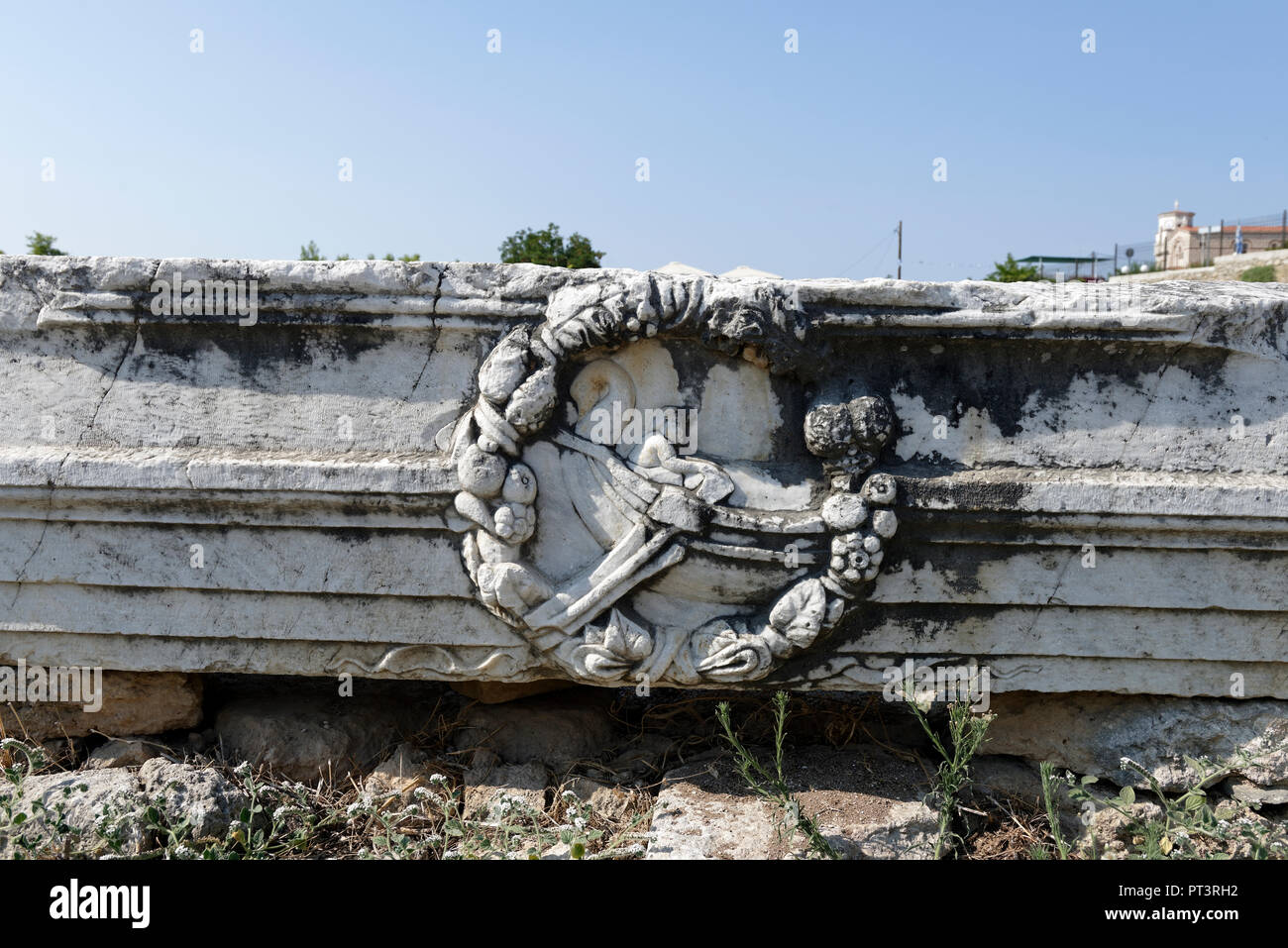 Ornate marble ruin from the Peribolos of Apollo, a marble peristyle adjacent Lechaion road. Ancient Corinth. Peloponnese. Greece. Stock Photo