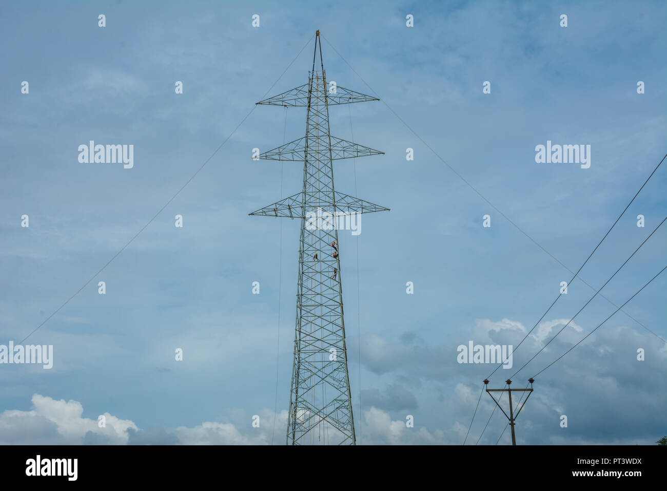 Electric tower work Stock Photo Alamy