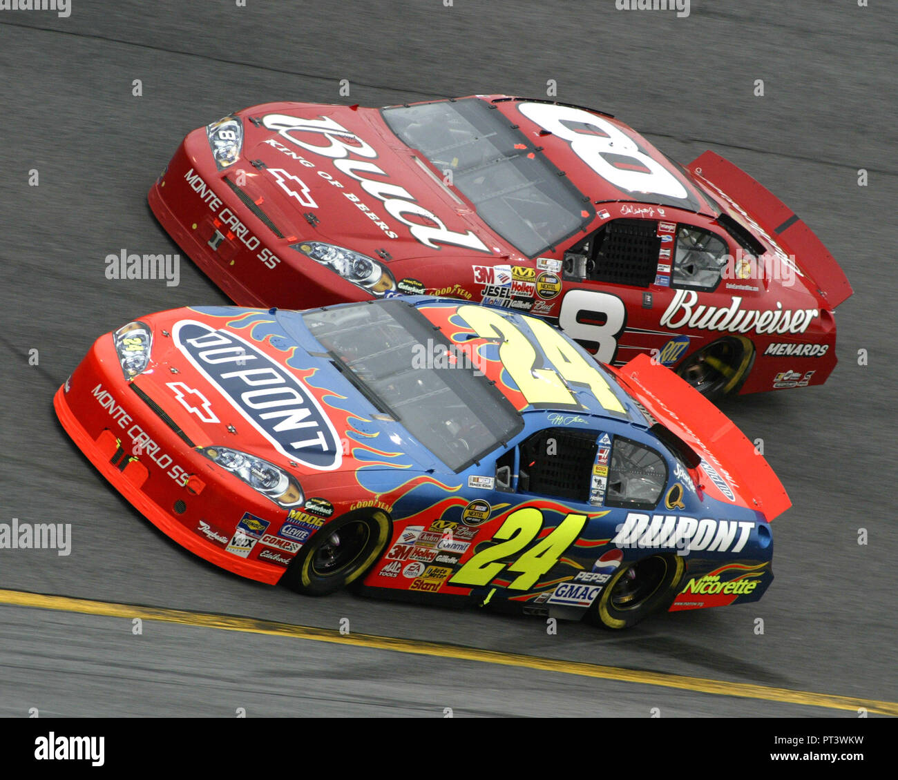 Jeff Gordon(24) passes Dale Earnhardt Jr in turn four during the running of the NASCAR Daytona 500 at Daytona International Speedway in Daytona Beach,  Florida on February 19, 2006. Stock Photo