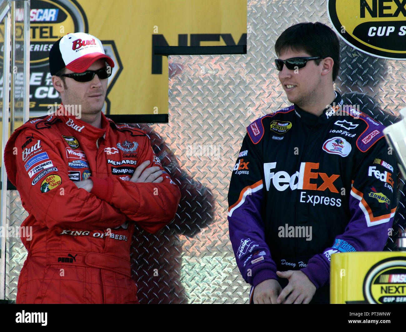 Dale Earnhardt Jr(l) and Denny Hamlin are introduced during driver introductions prior to the Nextel Cup Ford 400 at Homestead-Miami Speedway in Homestead, Florida on November 19, 2006. Stock Photo