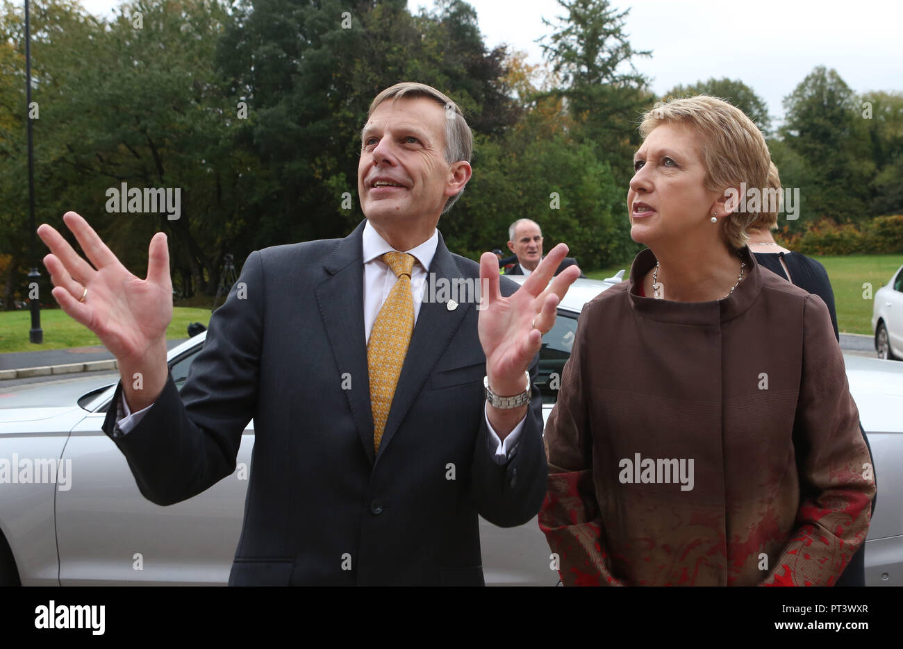 HANDOUT PHOTO: Queen’s Vice-Chancellor Professor Sir Peter Gregson greets the of Former President of Ireland Professor Mary McAleese for the offical opening of Queen's University Riddel Hall, Belfast, Friday 19th, 2012. Photo/Paul McErlane  Former President of Ireland Professor Mary McAleese will today officially open Queen’s University’s Riddel Hall campus, which has been transformed into a 21st century portal for the economic development of businesses across the island of Ireland. Riddel Hall, which was endowed to the University by Eliza and Isabella Riddel almost 100 years ago, is also the  Stock Photo