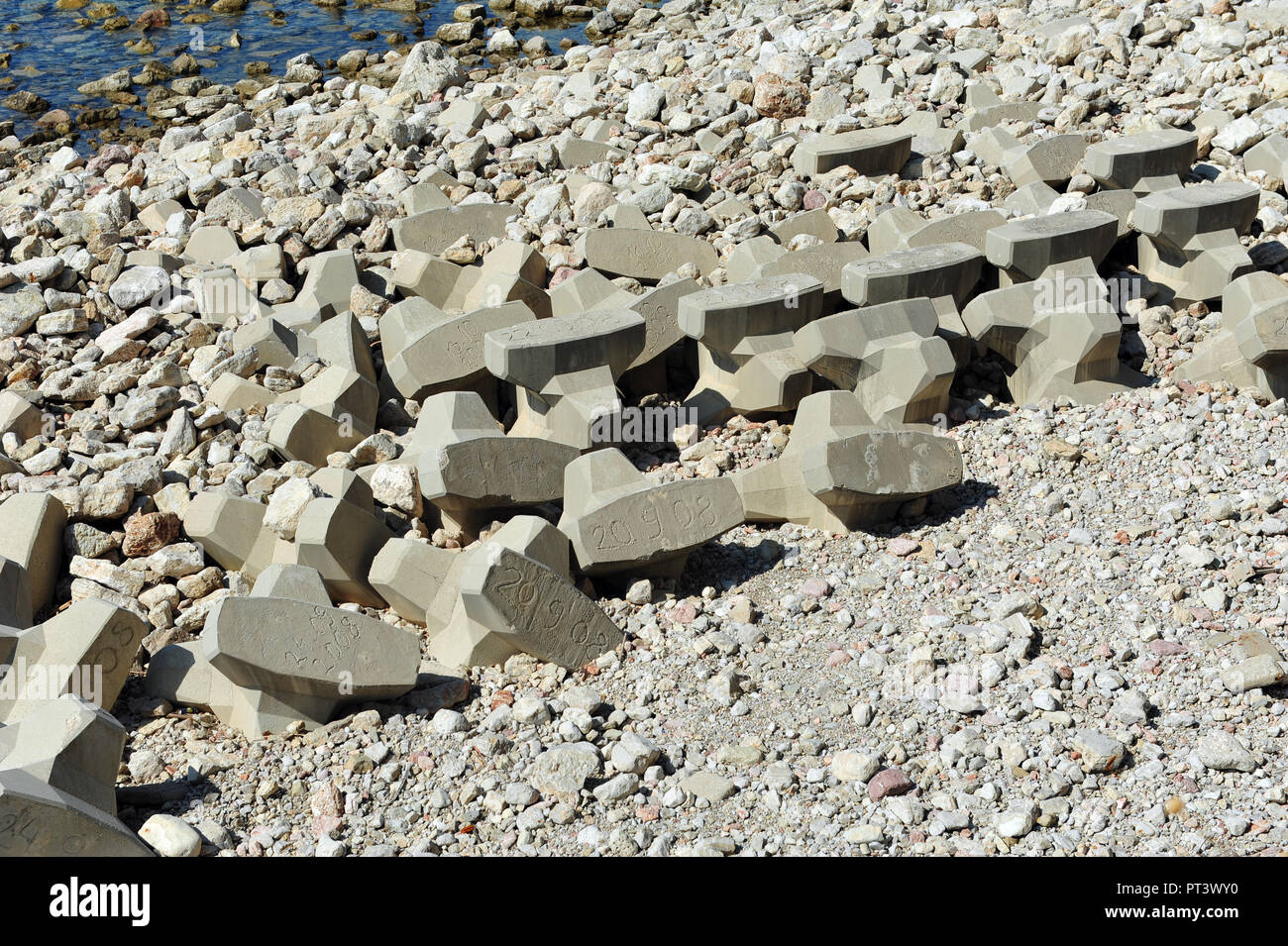 Close up mix of boulders, rocks and wave braker stones. Horizontal ...
