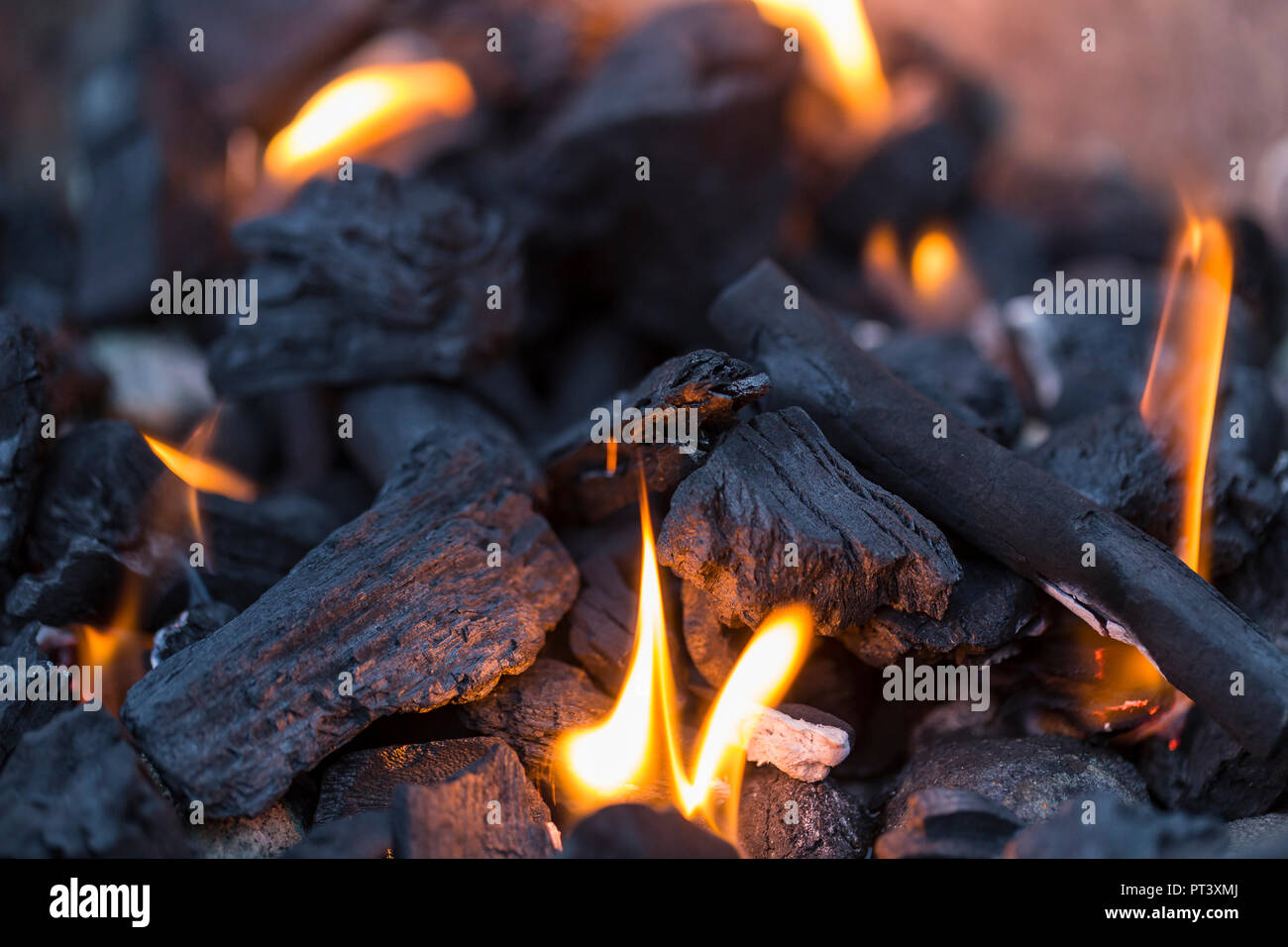 Charcoal fire with flames for barbecue Stock Photo Alamy