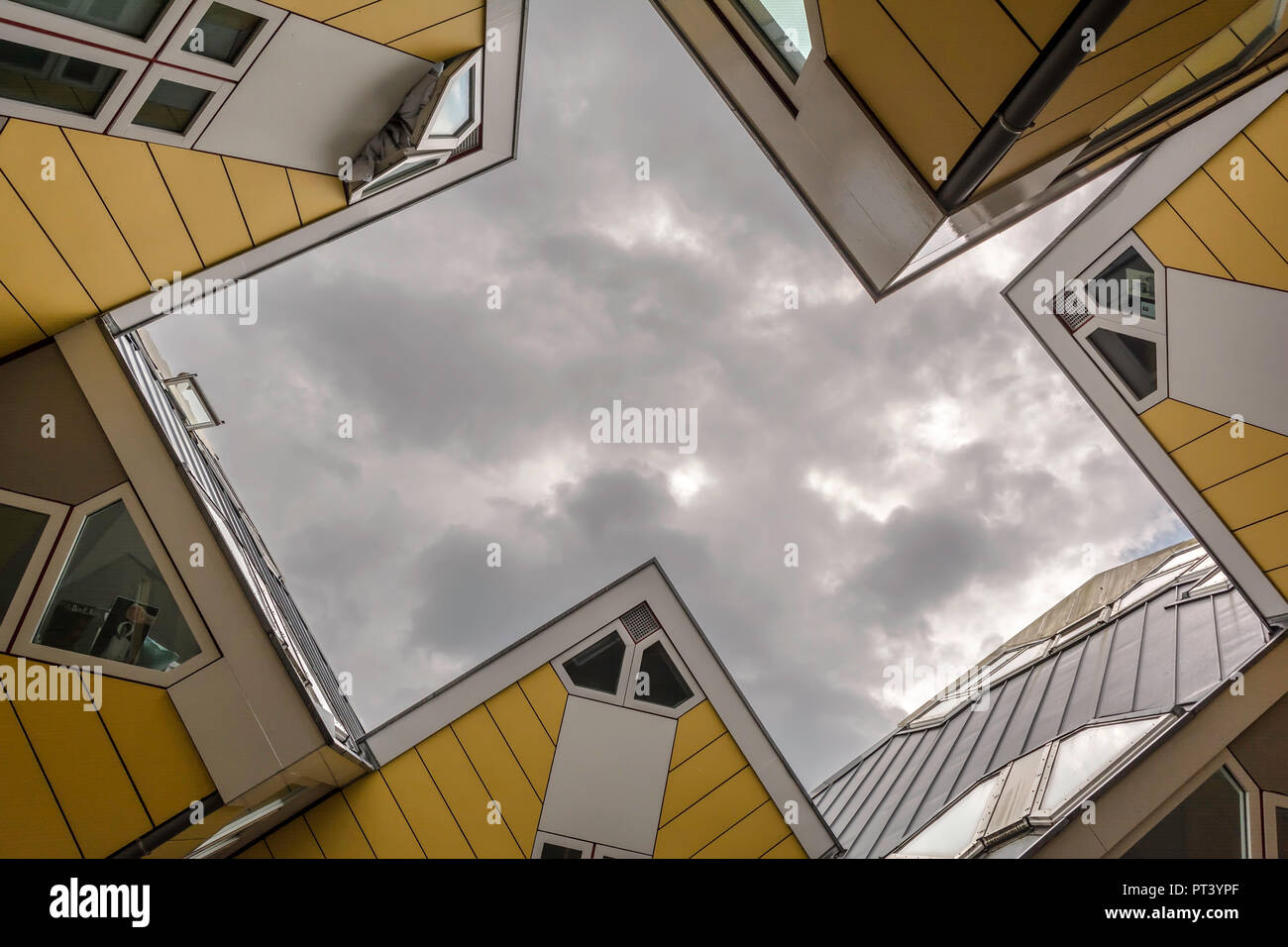 Cube Houses in Rotterdam, Netherlands viewed from beneath in dull cloudy day.  It is a set of innovative houses Stock Photo