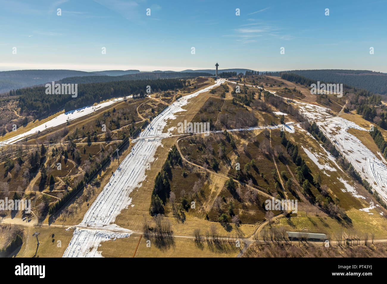 Ettelsberg with snow remains on the runs in Willingen, Upland, Waldeck-Frankenberg, Hesse, Germany Stock Photo