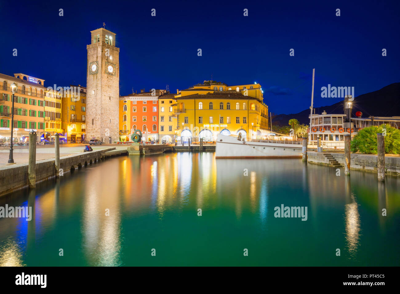 Torre Apponale and Piazza 3 Novembre at dusk, Riva del Garda, Garda Lake, Trento province, Trentino Alto Adige, Italy, Europe, Stock Photo