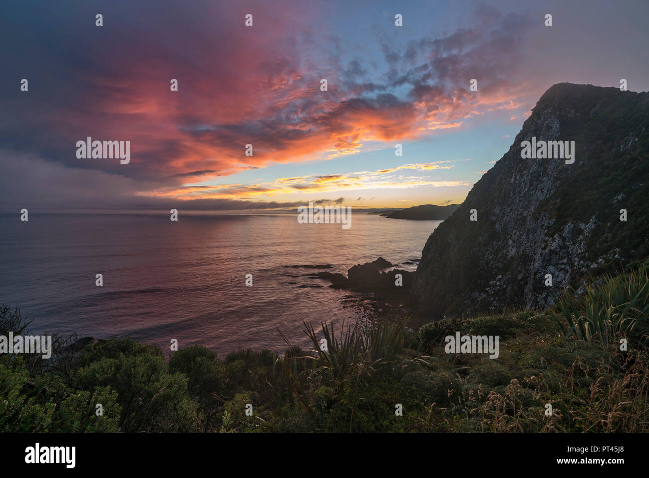 Sunset from Nugget Point, Ahuriri Flat, Clutha district, Otago region, South Island, New Zealand, Stock Photo