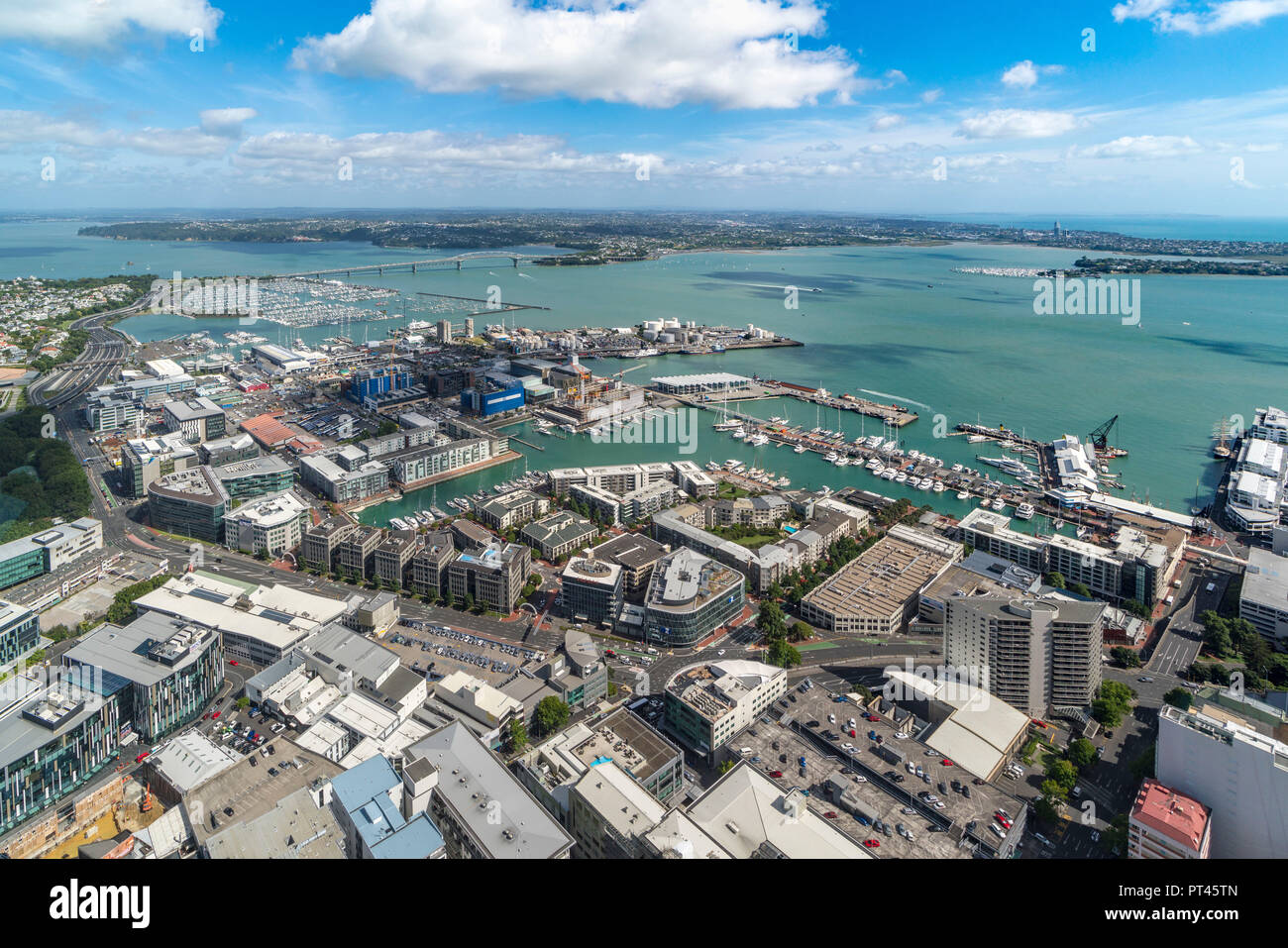View of the city harbour and bridge from Sky Tower, Auckland City, Auckland region, North Island, New Zealand, Stock Photo