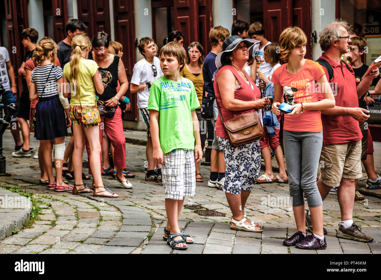 Group of teenage boys and girls on a day trip to old town Bratislava, Slovakia Stock Photo