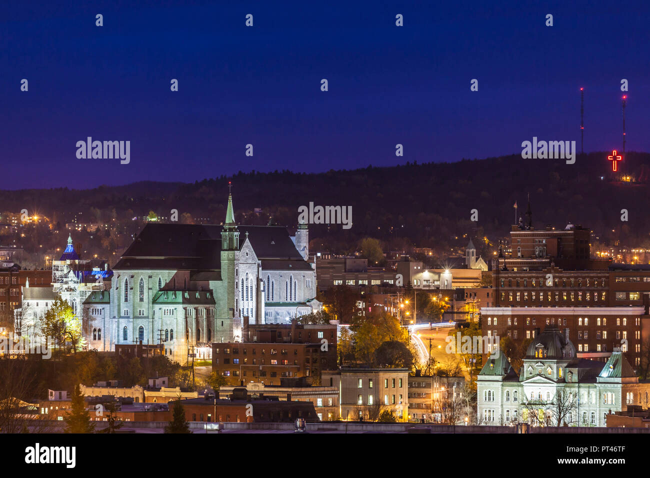 Canada, Quebec, Estrie Region, Sherbrooke, elevated town view with the Cathedrale St-Michel, and Hotel de Ville, town hall, dusk Stock Photo