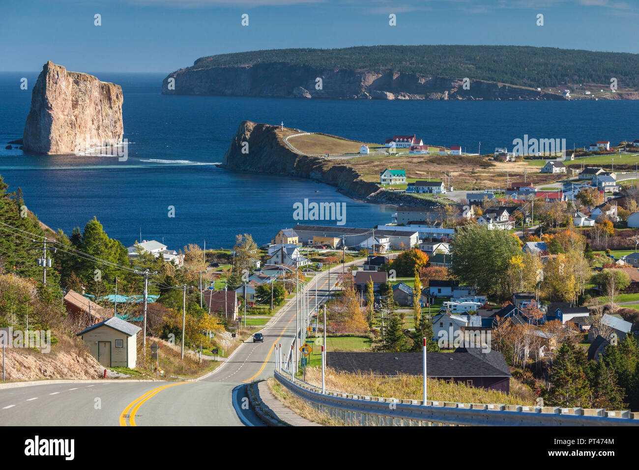 Canada, Quebec, Gaspe Peninsula, Perce, elevated view of town and Perce Rock from Rt 132 Stock Photo
