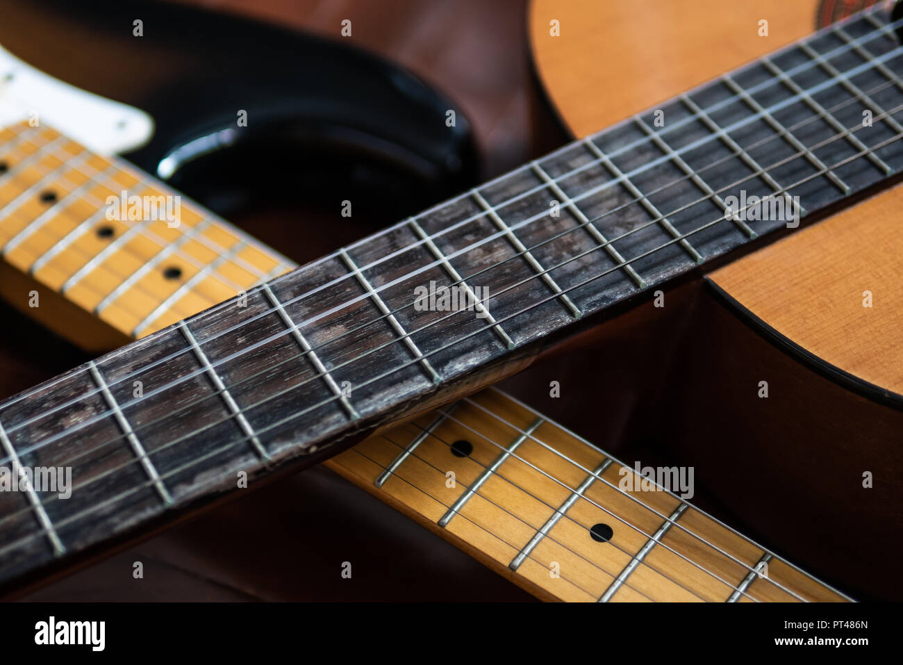 Classical guitar and electric guitar necks Stock Photo Alamy