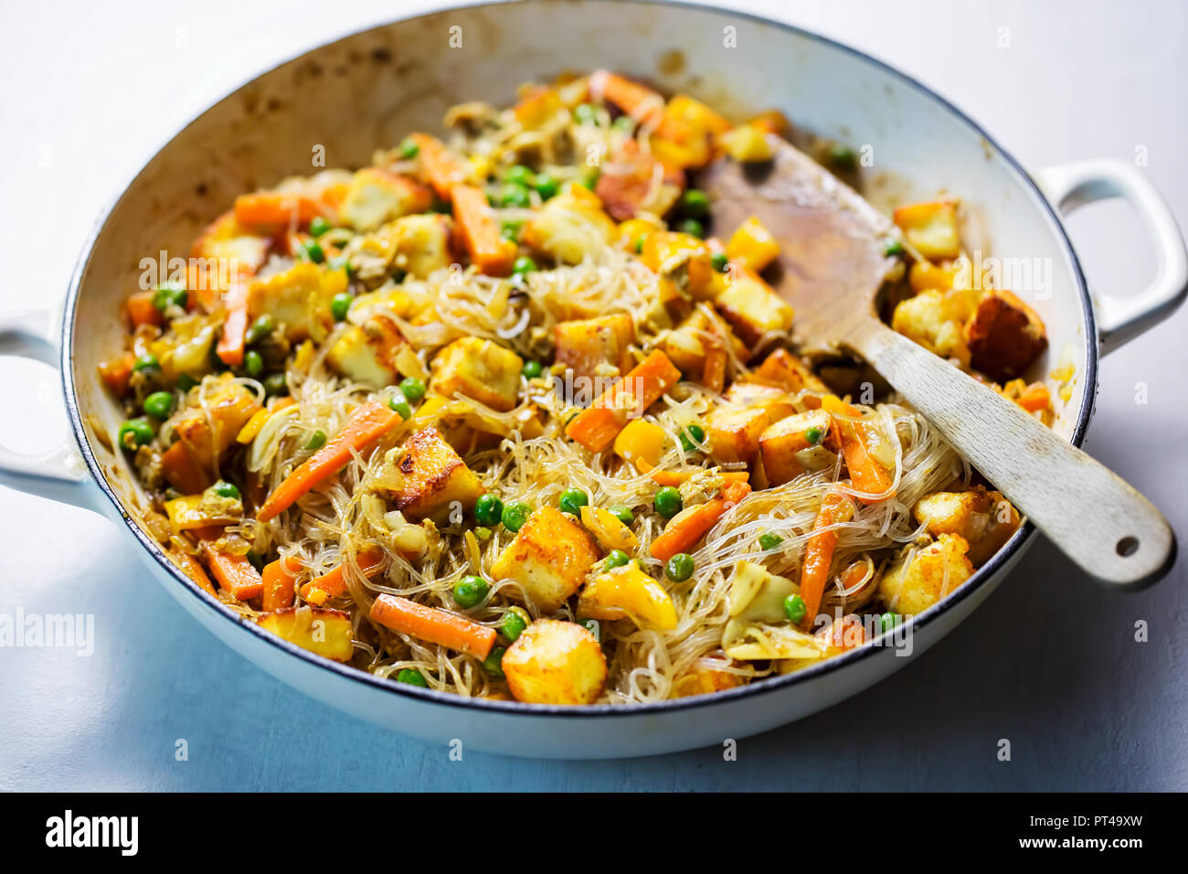 Rice noodles with paneer cheese, peas & carrots Stock Photo Alamy