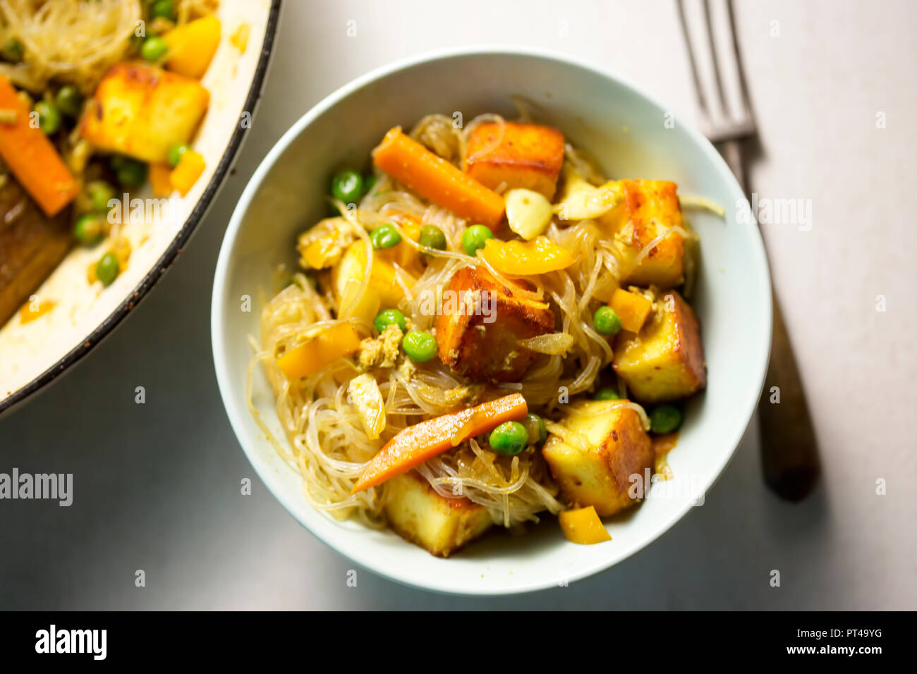 Rice noodles with paneer cheese, peas & carrots Stock Photo Alamy