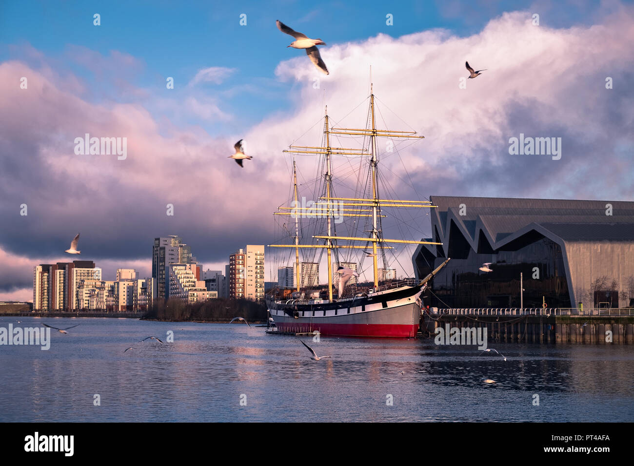 Morning view on the river Clyde and Glenlee, steel-hulled three-masted barque. The Tall Ship at Glasgow Harbour. Scotland Stock Photo