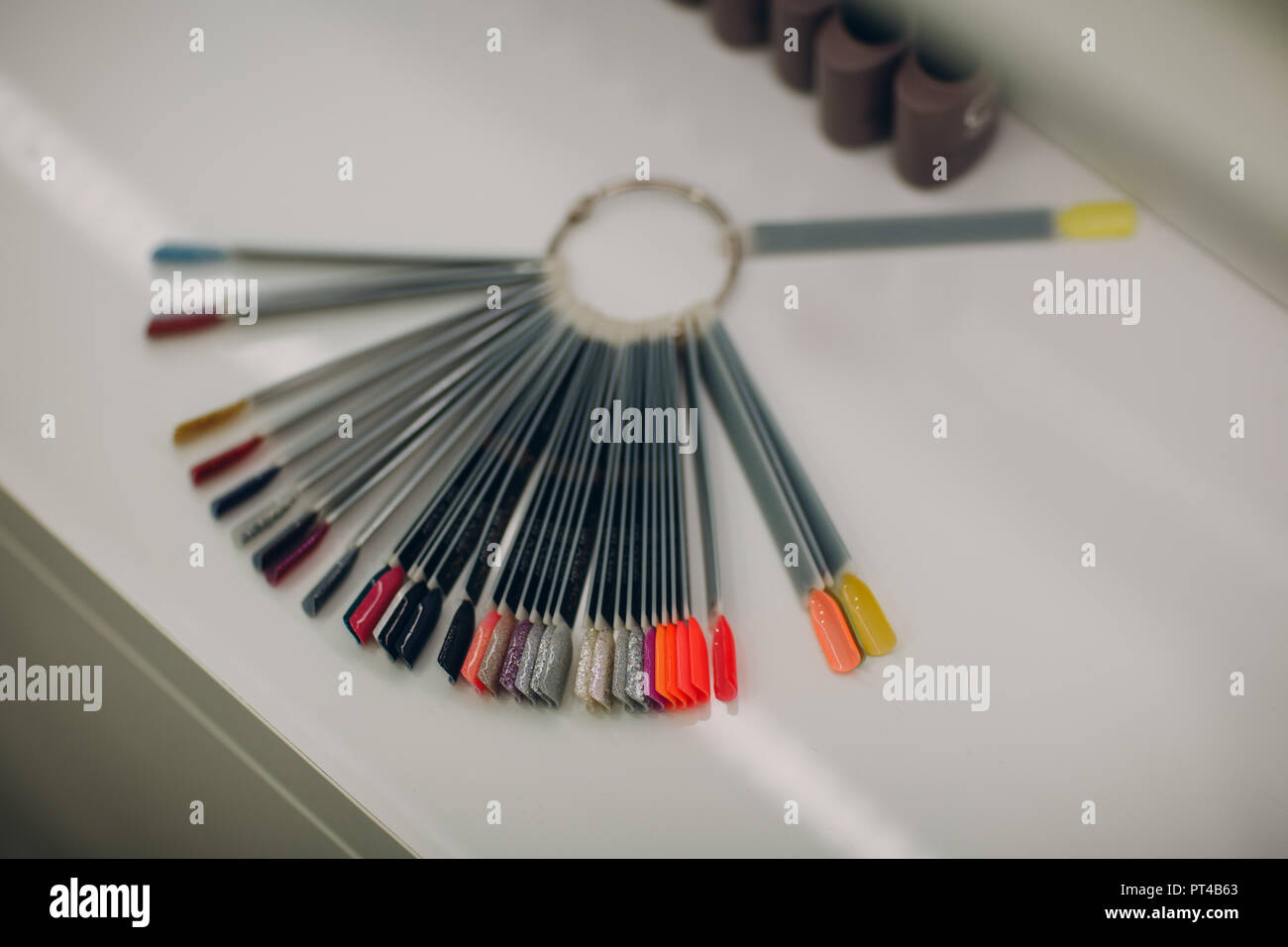 Gray Shellac Nails set of different colorful nails polish palette for a manicure and shellac stock image