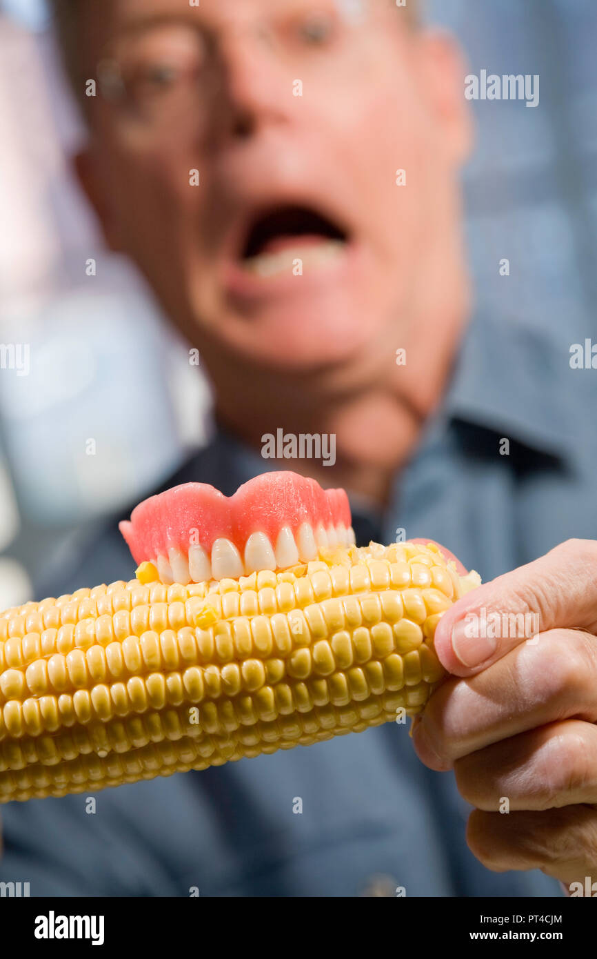 Senior man loses dentures eating corn on the cob, USA Stock Photo Alamy