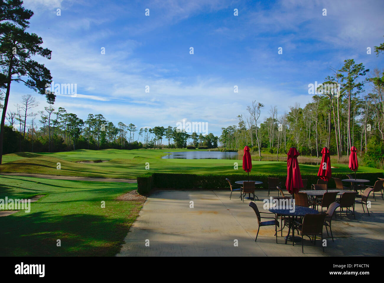 Outside deck behind 18th hole at Kilmarlic golf club in Powells Point NC  Stock Photo - Alamy