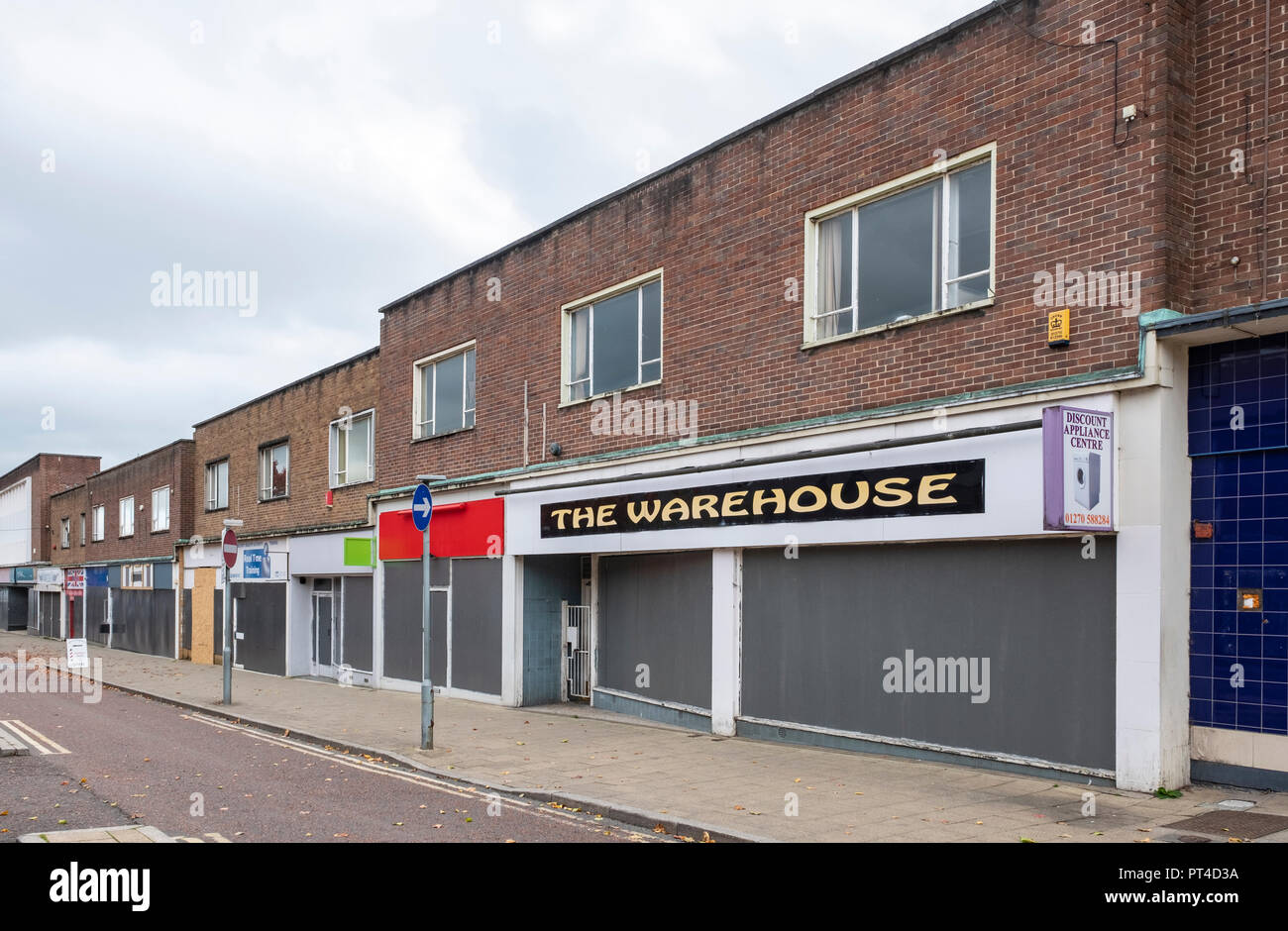 A complete or whole street boarded up in Crewe town centre Cheshire UK