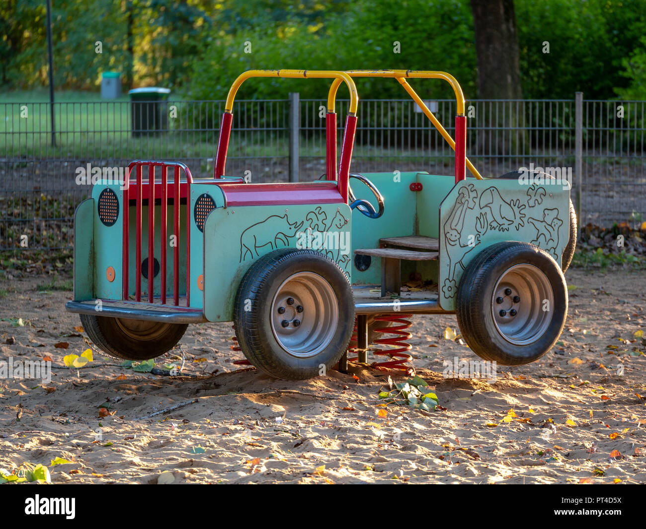 Close Up Image Of Swing Car At Playground In Sandpit Stock