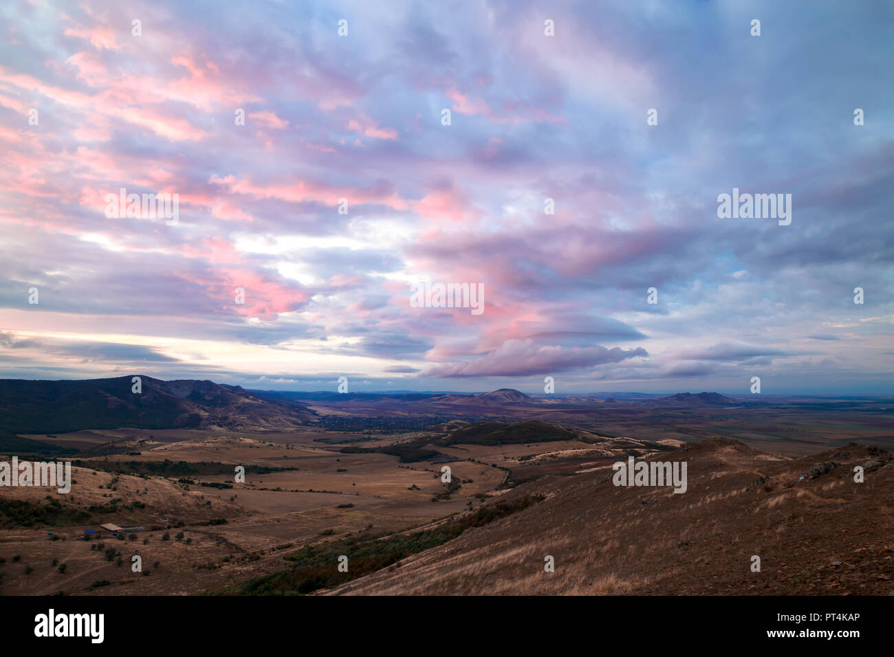 Panorama view of the mountains Macin, Romania with spectacular sky Stock Photo