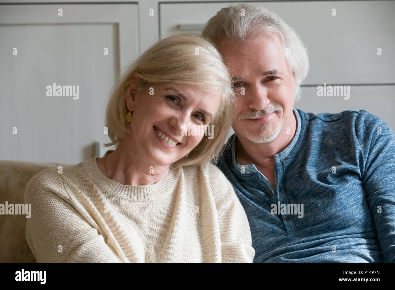 Headshot portrait of smiling loving mature couple feeling happy Stock Photo